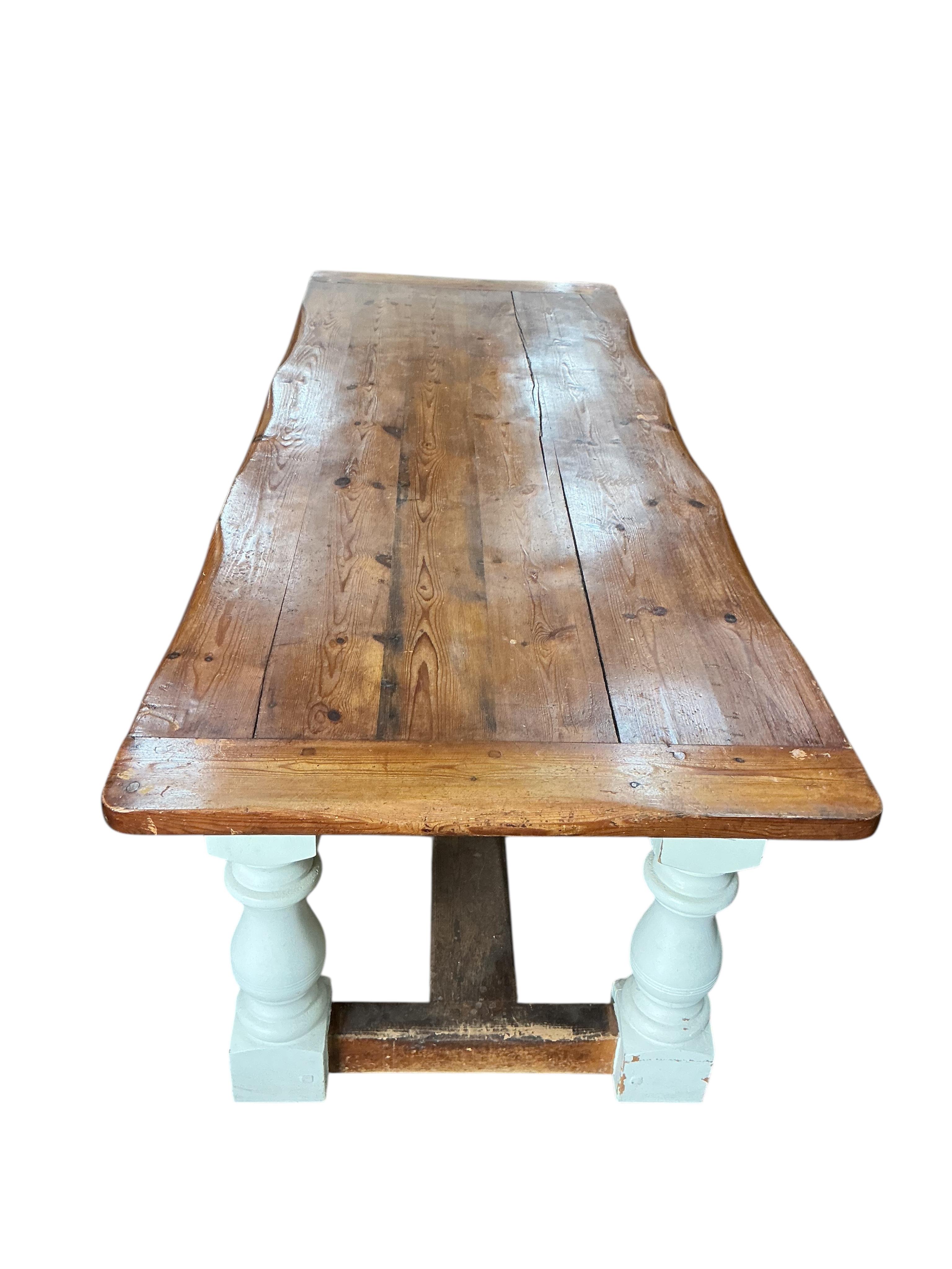 An 18th century style part painted rectangular pine refectory dining table, width 241cm, depth 92cm, height 74cm